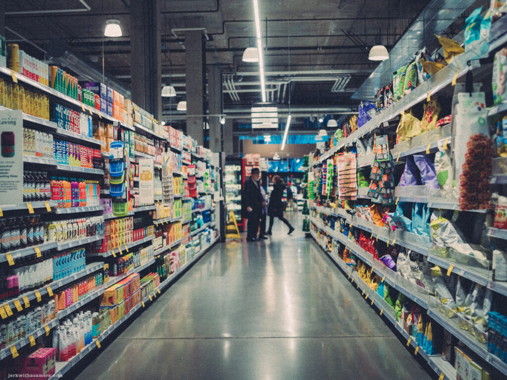 Shopper browsing through a grocery aisle captured through the lens of a Hasselblad 503CXI with a 100 megapixel CFV 100 digital back and Carl Zeiss Distagon T* 60mm F/3.5 CB Lens.