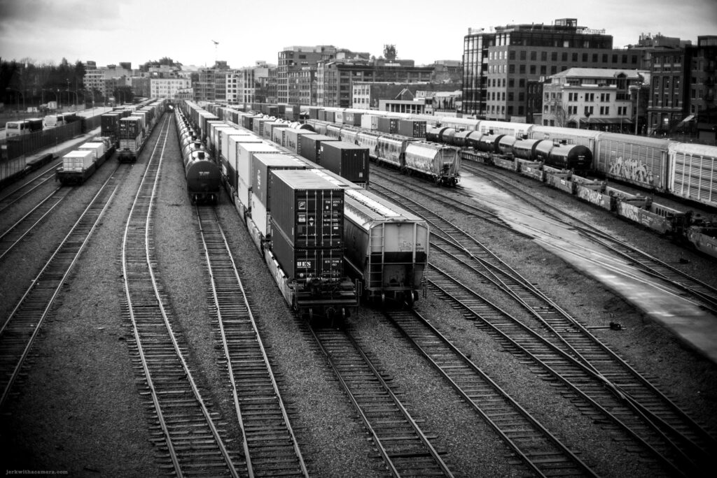 Trains and container cars in a Vancouver rail yard