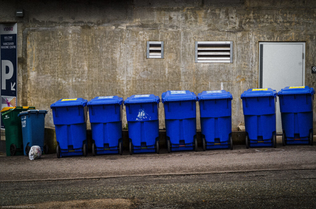 Row of blue recycling bins lined up along a wall
Camera: Leica M11-D
Lens: Leica M Summilux 75mm f/1.4