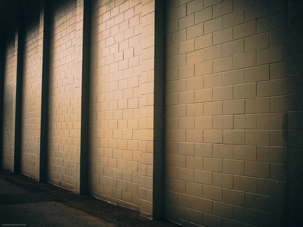Light and shadow on a concrete block wall
