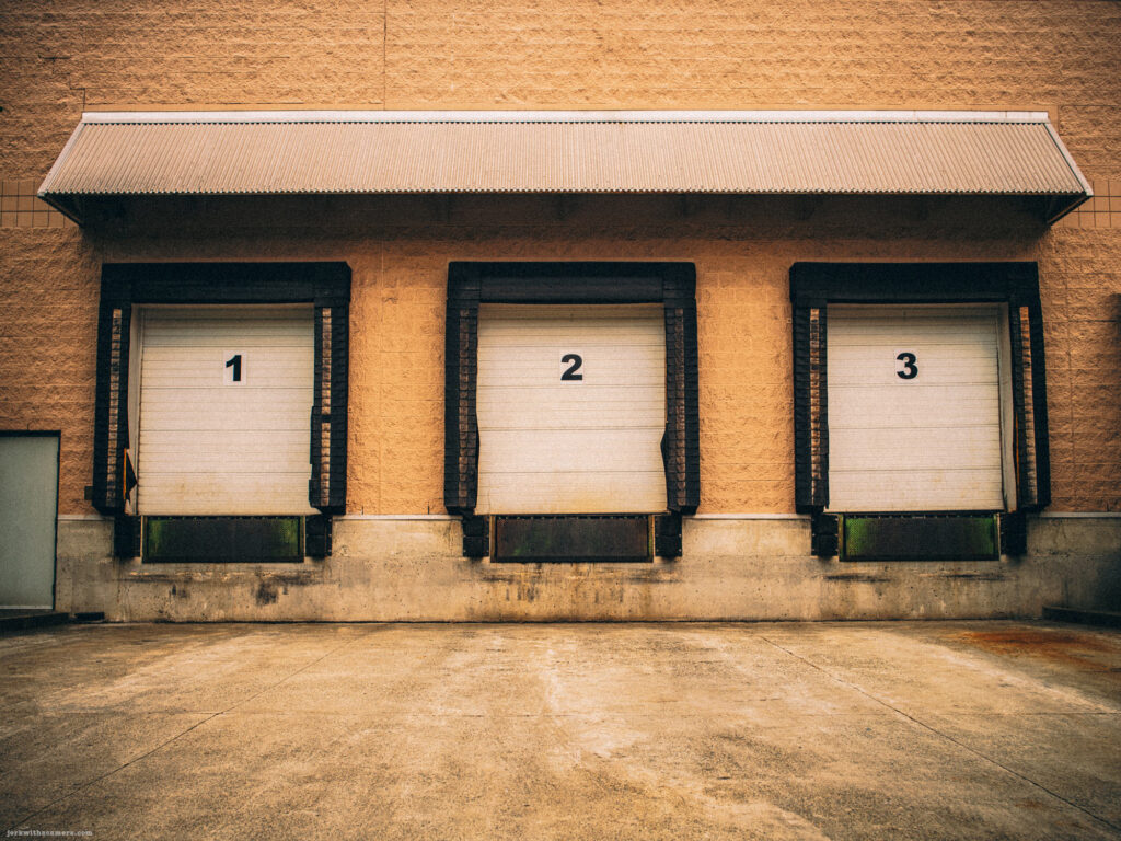 Three numbered loading dock doors.